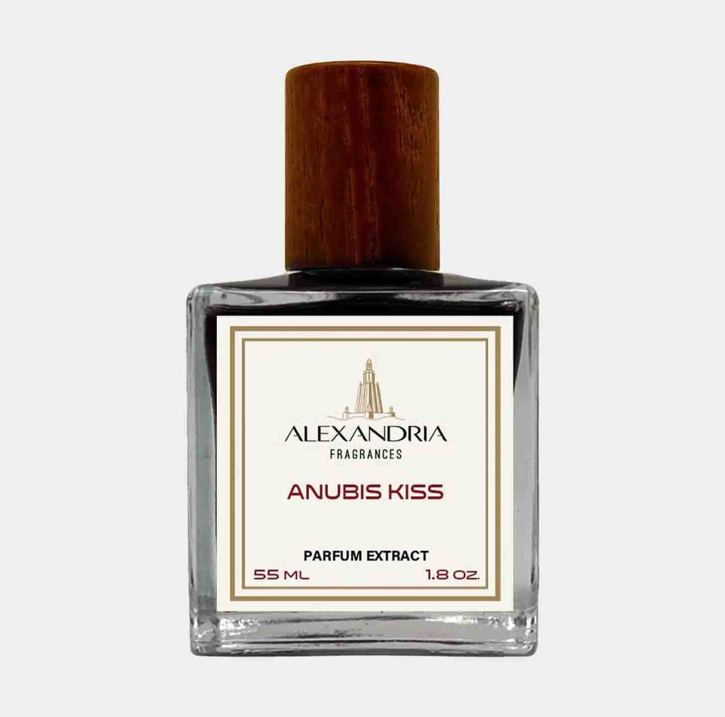 A clear glass bottle of Alexandria Fragrances Anubis Kiss Sample, featuring a wooden cap and a label indicating a 55 ml parfum extract. The elegant design showcases the luxurious scent inside.
