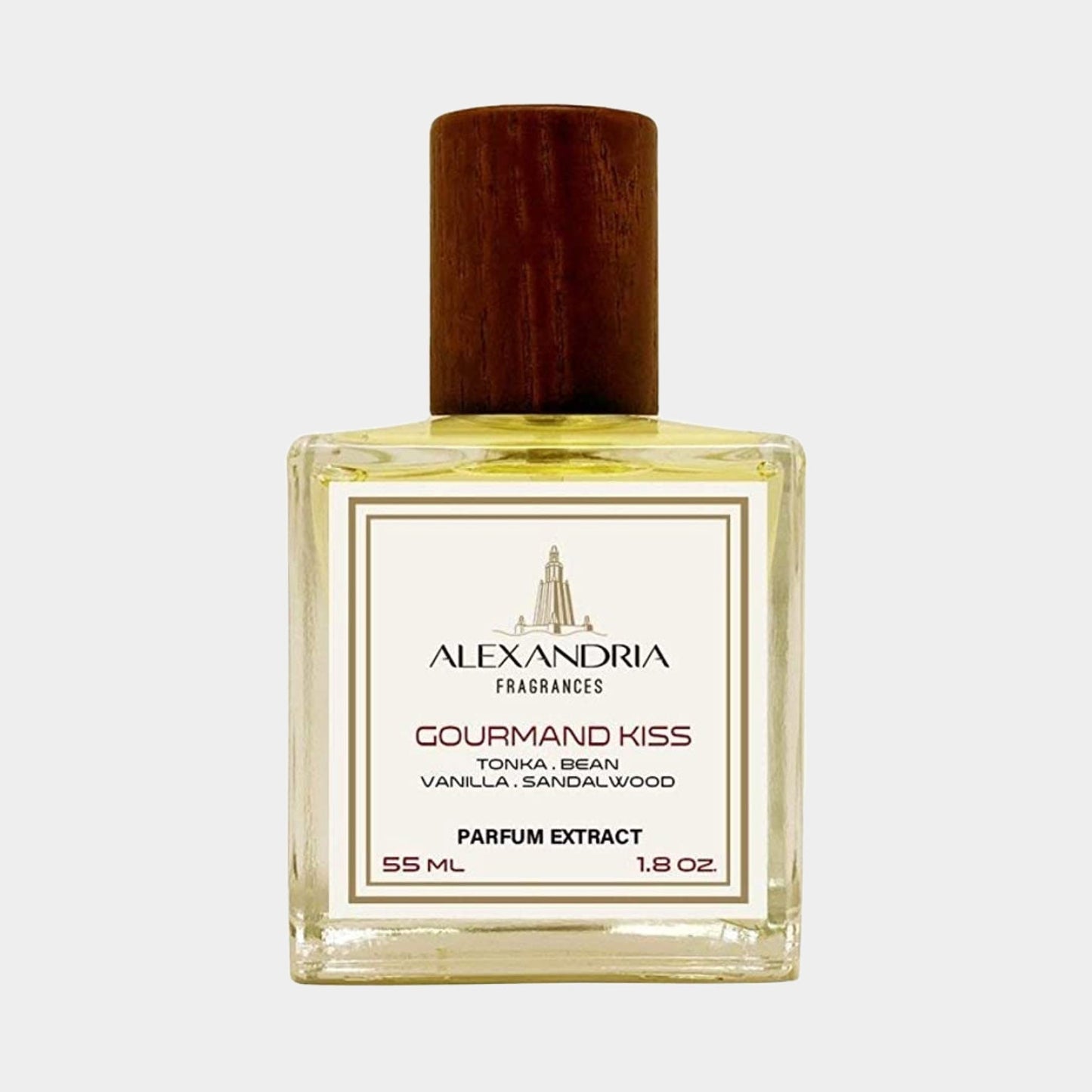 A bottle of Alexandria Fragrances Gourmand Kiss Sample, featuring a transparent glass design with a wooden cap. The label highlights notes of tonka bean, vanilla, and sandalwood in a 55 ml parfum extract.