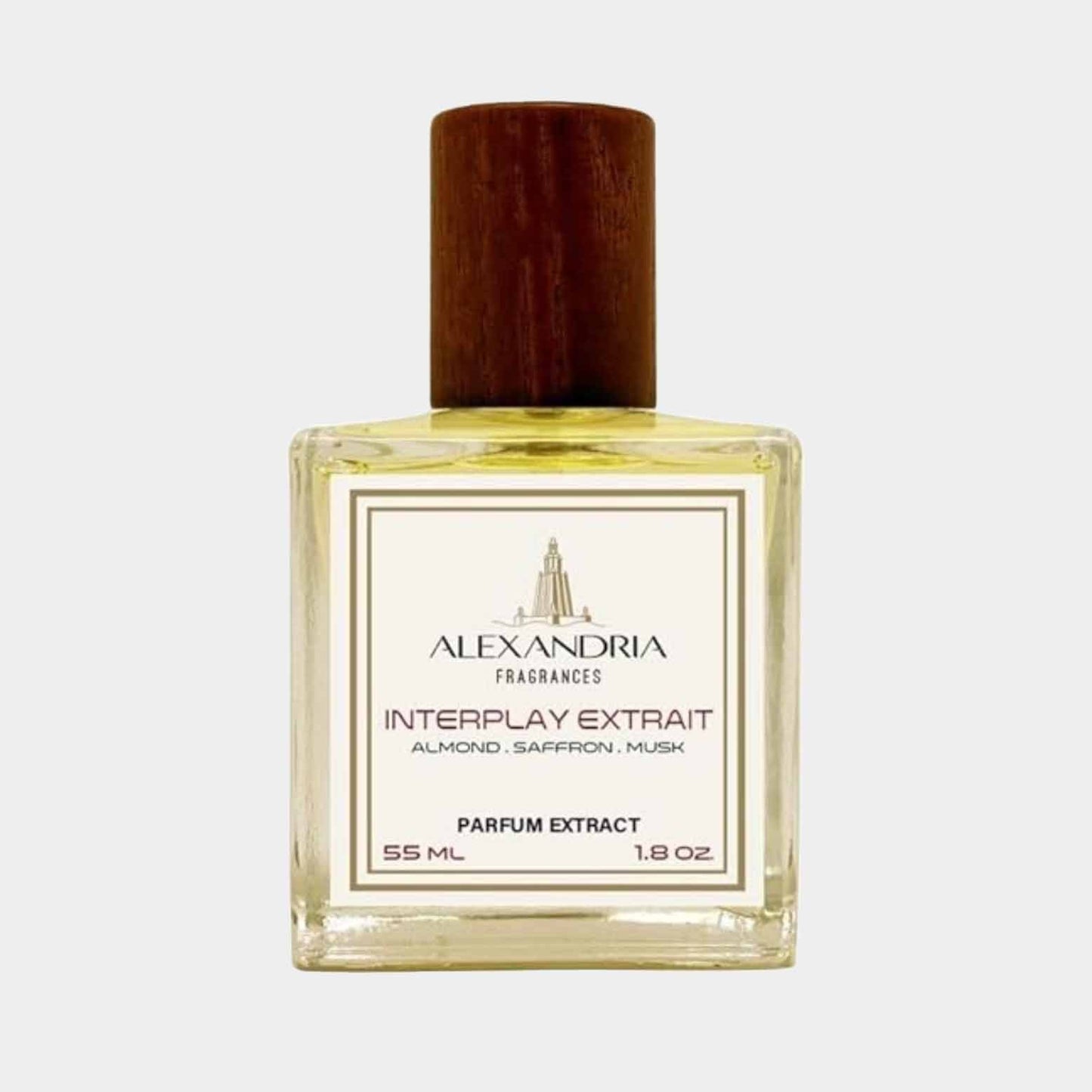 A glass bottle of Alexandria Interplay Extrait, featuring a wooden cap and a golden liquid, labeled as a parfum extract in a 55 ml size. The fragrance combines notes of almond, saffron, and musk.