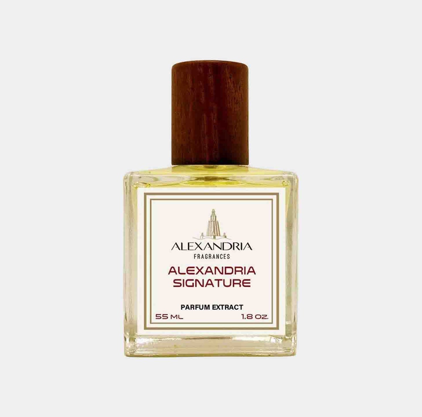 A 55 ml bottle of Alexandria Fragrances Signature perfume extract, featuring a clear glass design with a wooden cap and a label that reads Alexandria Signature.