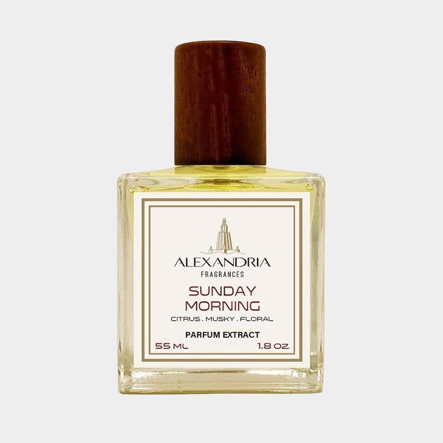 A sample bottle of Alexandria Fragrances Sunday Morning, featuring a stylish design with a wooden cap. The parfum extract contains vibrant citrus, musky, and floral notes, and holds 1.8 oz (55 ml).
