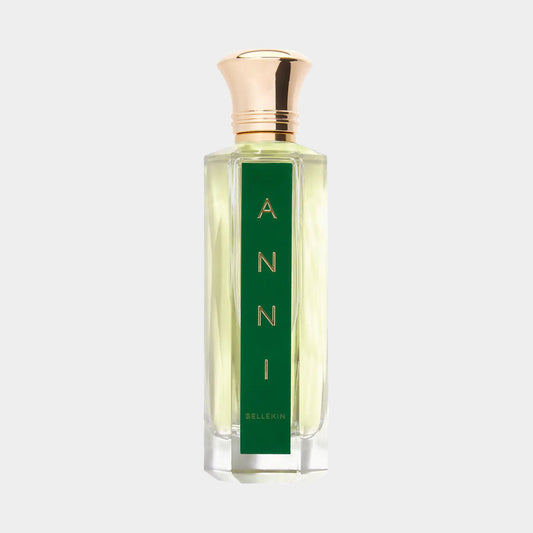 A stylish bottle of Bellekin Anni Sample perfume, featuring a clear glass design and a green label with gold lettering. The elegant gold cap adds a touch of luxury to the fragrance presentation.
