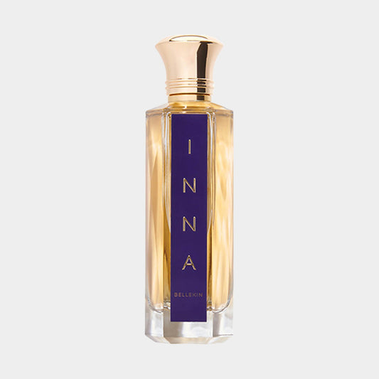 A full bottle of Bellekin Inna perfume, featuring a sleek glass design with a golden cap and a prominent purple label displaying the name INNA.