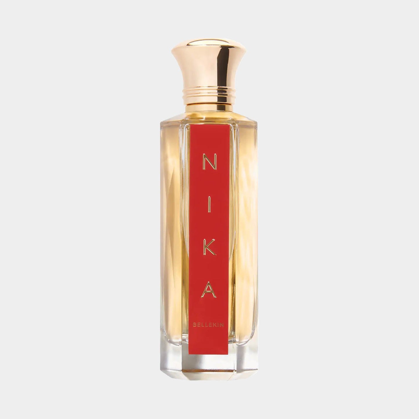 Bellekin Nika full bottle featuring an elegant design with a gold cap and a bold red label displaying the name 'NIKA'.