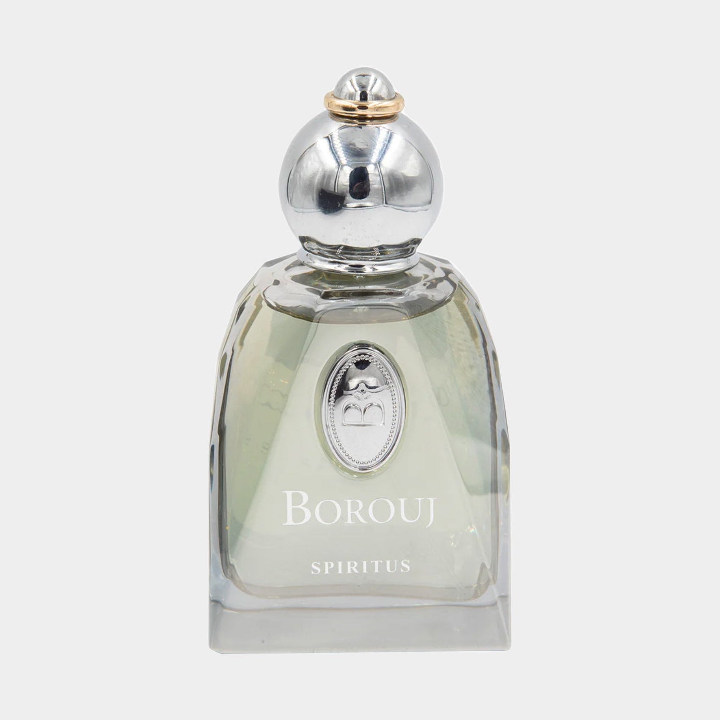 A stylish glass bottle of Borouj Spiritus perfume, featuring a sleek design and a silver cap, showcasing the fragrance's elegant essence.