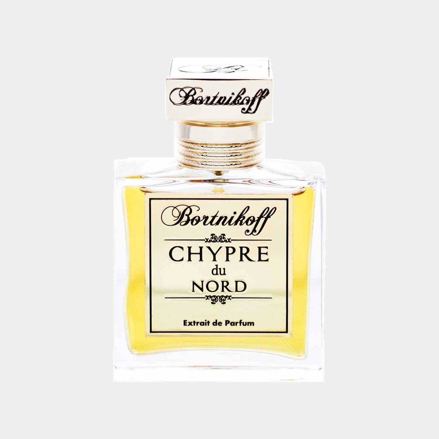 A clear glass bottle of Bortnikoff Chypre Du Nord Sample, featuring a gold cap and elegant labeling. The perfume inside is a rich yellow hue, suggesting luxurious and sophisticated fragrance notes.