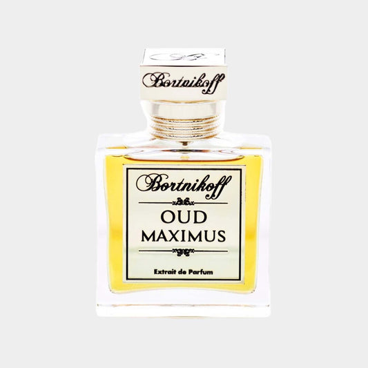 A full bottle of Bortnikoff Oud Maximus, featuring an elegant glass design with a gold label and a square cap, showcasing a rich yellow fragrance inside.
