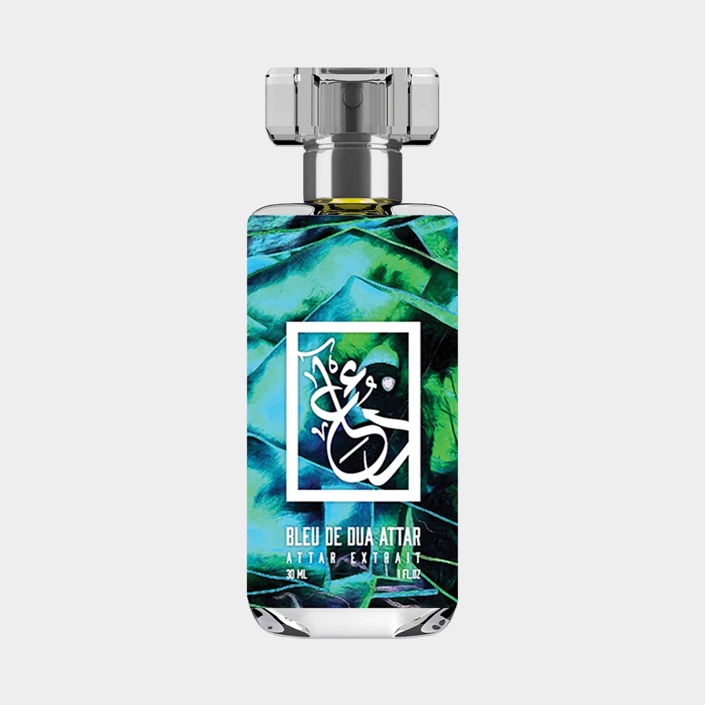 Dua Bleu de Dua Attar Sample in a decorative bottle featuring a vibrant green and blue design, containing 30 ml of concentrated fragrance.