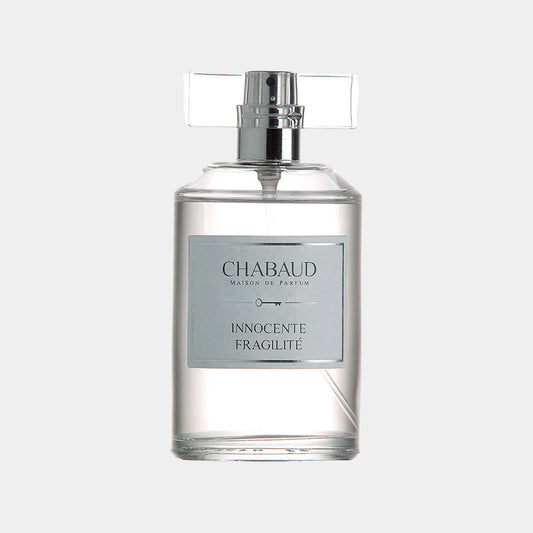 Chabaud Maison de Parfum Innocente Fragilité Sample is a sleek glass perfume bottle featuring a minimalist design, with a silver label and a decorative cap. The fragrance is known for its delicate and airy scent profile.