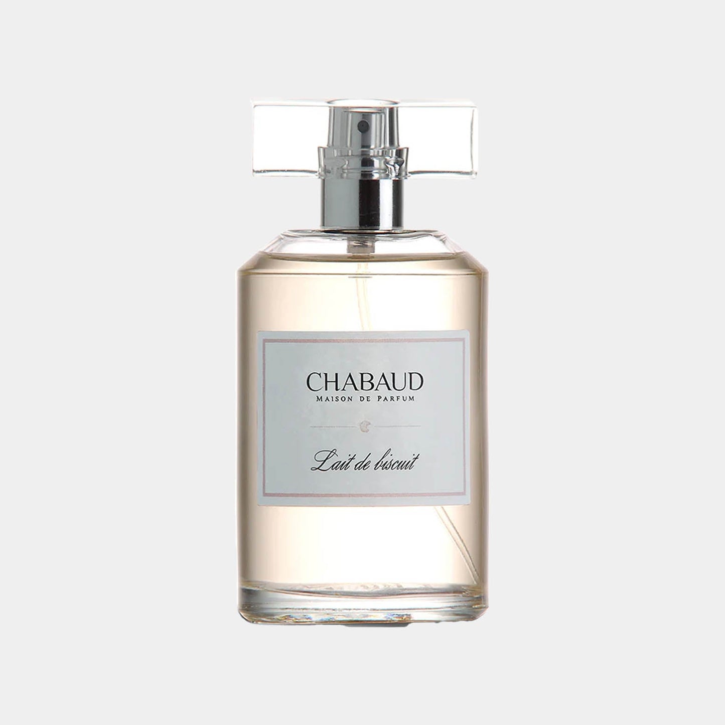 A sample bottle of Chabaud Maison de Parfum Lait de Biscuit EDT, featuring a clear glass design with a rectangular label displaying the brand name and fragrance title, capturing an elegant and inviting scent.