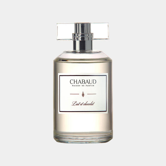 A sleek, clear glass bottle of Chabaud Maison de Parfum Lait Et Chocolat EDT, featuring a minimalist label and a stylish cap, showcasing its elegant design.
