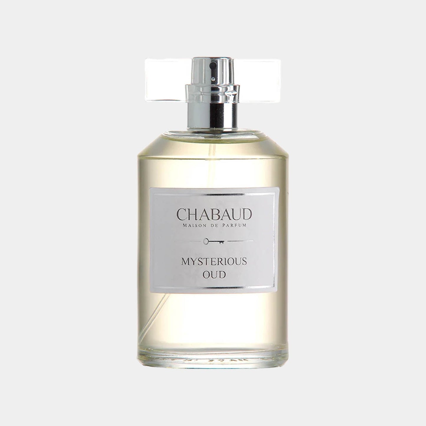 A clear bottle of Chabaud Maison de Parfum Mysterious Oud, featuring a sleek design and a simple label, showcasing the elegant fragrance inside.