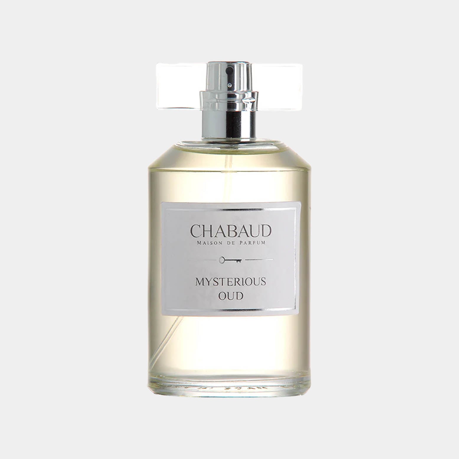 A clear bottle of Chabaud Maison de Parfum Mysterious Oud, featuring a sleek design and a simple label, showcasing the elegant fragrance inside.