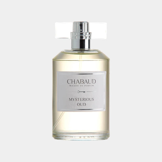A clear bottle of Chabaud Maison de Parfum Mysterious Oud, featuring a sleek design and a simple label, showcasing the elegant fragrance inside.
