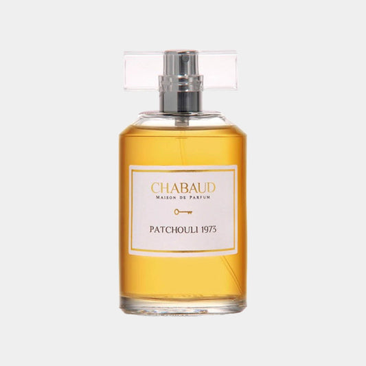 A sample bottle of Chabaud Maison de Parfum Patchouli 1973, featuring an elegant design with a clear glass container and a classic label, showcasing a warm golden fragrance.
