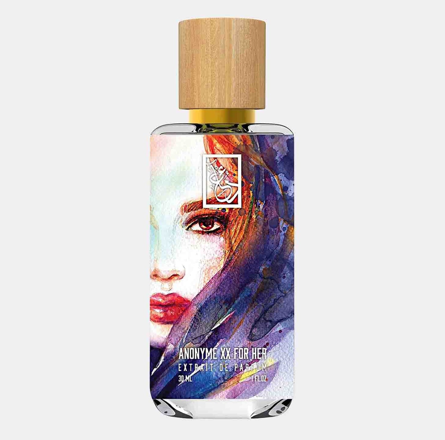 A sample bottle of Dua Anonyme XX for Her, featuring an artistic label with a colorful illustration of a woman's face. The 30ml fragrance is housed in a sleek glass bottle with a wooden cap.