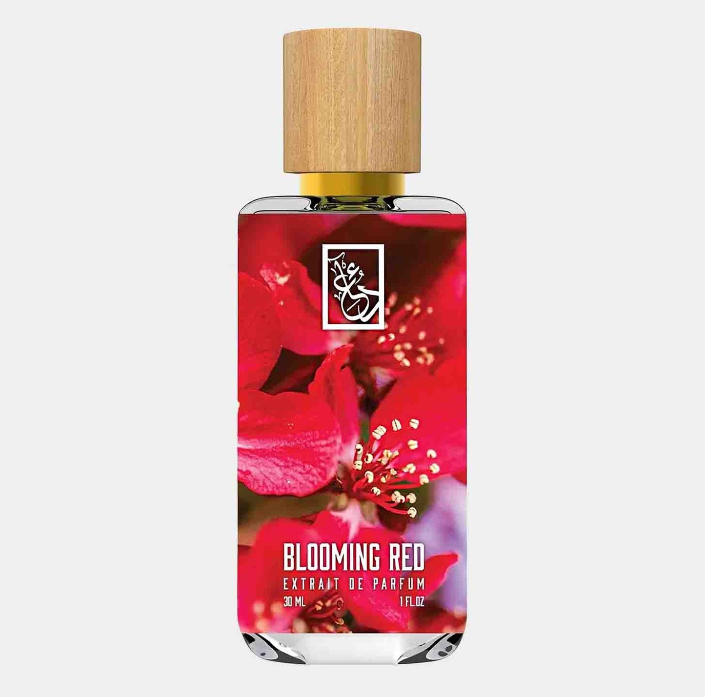 Dua Blooming Red Sample is a 30 ml bottle of extrait de parfum, featuring a vibrant floral design with red blooms and a natural wood cap, perfect for an elegant fragrance experience.