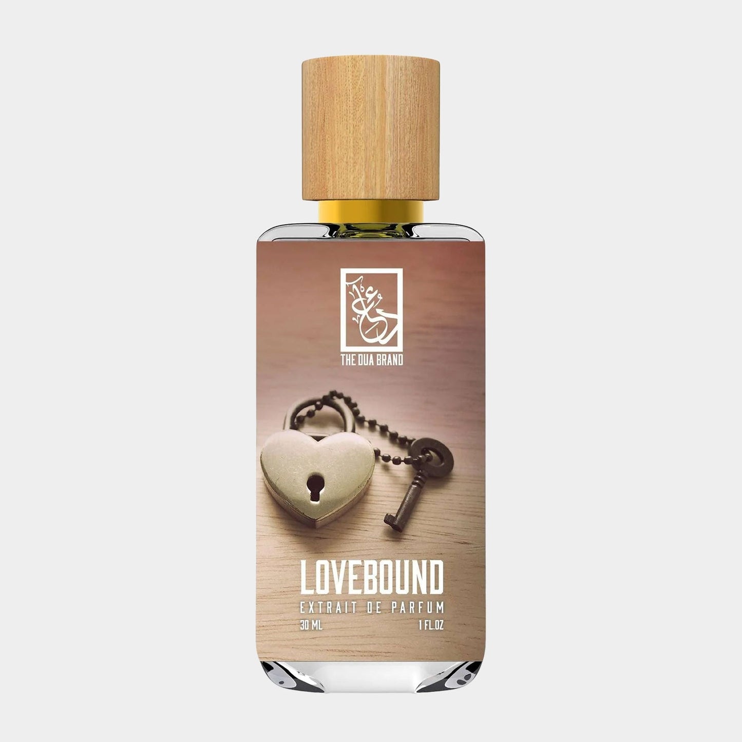 Dua Lovebound Sample, a 30 ml extrait de parfum featuring an elegant bottle with a wooden cap and a heart-shaped lock design, set against a soft background.
