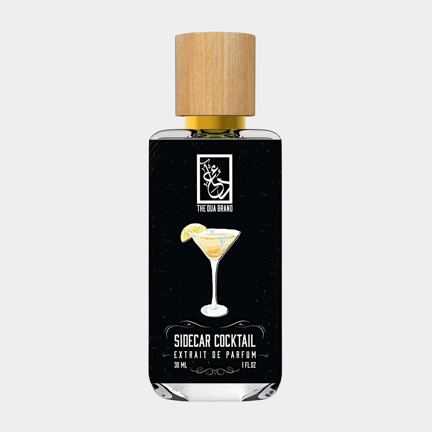 A bottle labeled Dua Sidecar Cocktail Sample, featuring a whimsical illustration of a cocktail glass with a lemon slice, set against a sleek black background. The bottle has a wooden cap and holds 30 mL of concentrated fragrance.