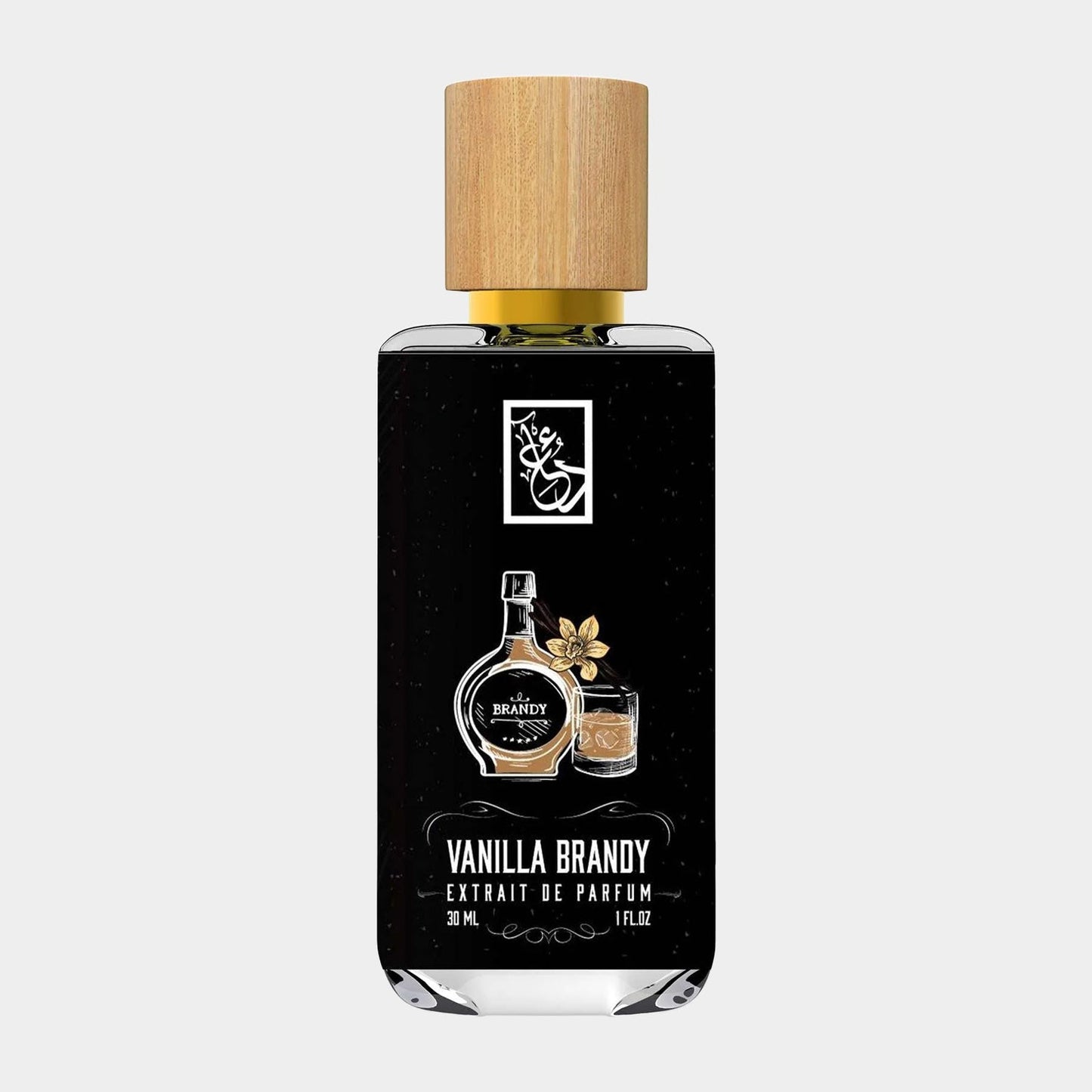 Dua Vanilla Brandy Sample bottle, featuring a sleek design with a wooden cap, contains 30 ml of an extrait de parfum that blends rich vanilla and brandy notes. The elegant label showcases the product name prominently.