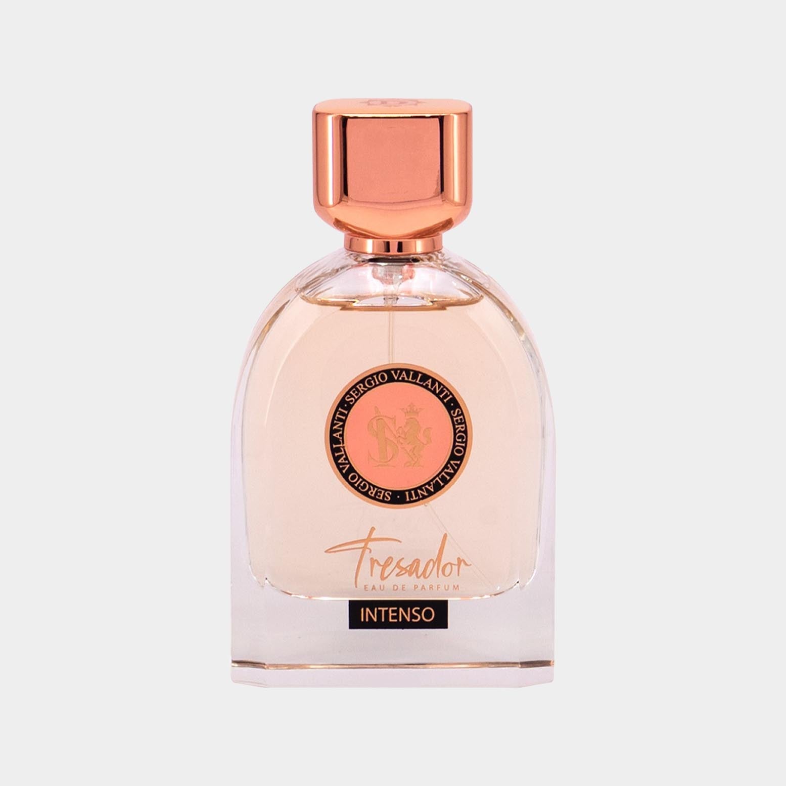 A full bottle of Tresador Intenso Eau de Parfum, featuring a clear glass container with a pink-hued liquid and an elegant gold and pink cap, adorned with a distinctive logo.