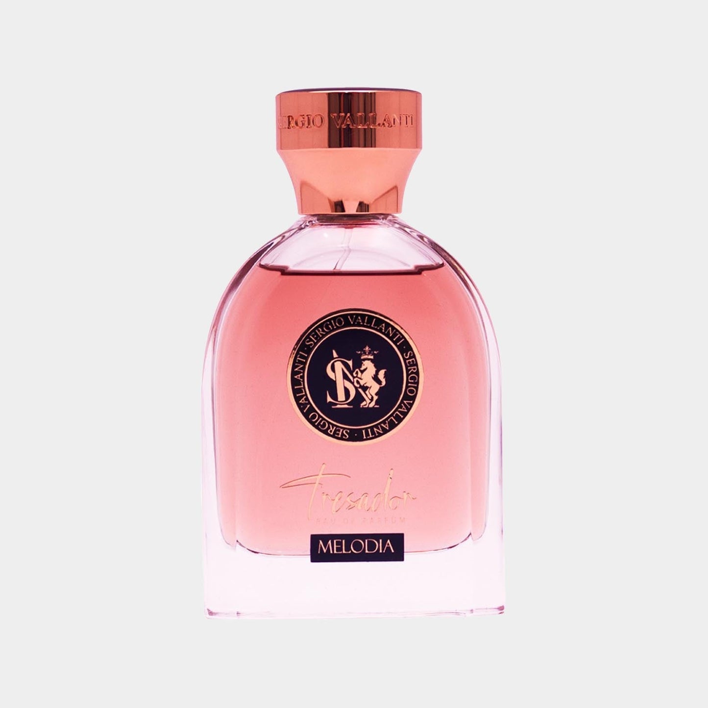 Elegant Tresador Melodia sample bottle featuring a curved design with a rose gold cap, showcasing a soft pink fragrance inside. The label displays the brand logo prominently.