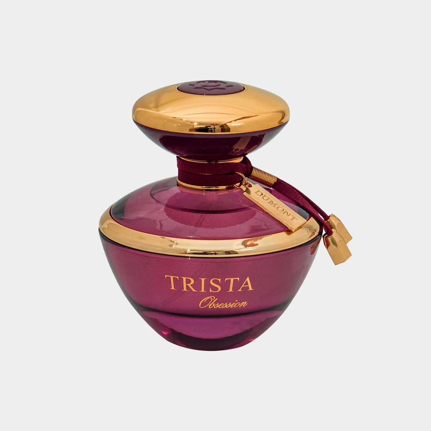 A full bottle of Trista Obsession perfume, featuring a round, deep purple glass design with gold accents and a stylish cap. The bottle is elegantly adorned with a crimson ribbon and a gold tag.