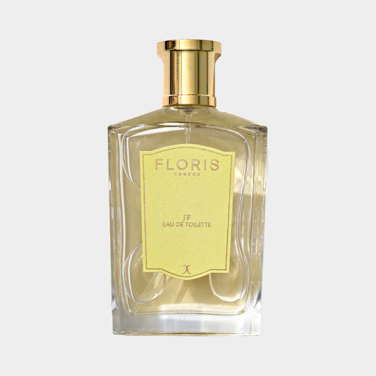 Floris London JF Sample, a square glass bottle with a gold cap and a pale yellow label, featuring a classic design and elegant fragrance.