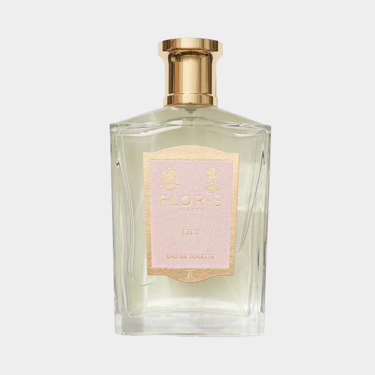 Floris London Lily Sample is an elegant eau de toilette presented in a stylish glass bottle with a golden cap and a soft pink label, exuding a fresh and floral scent.