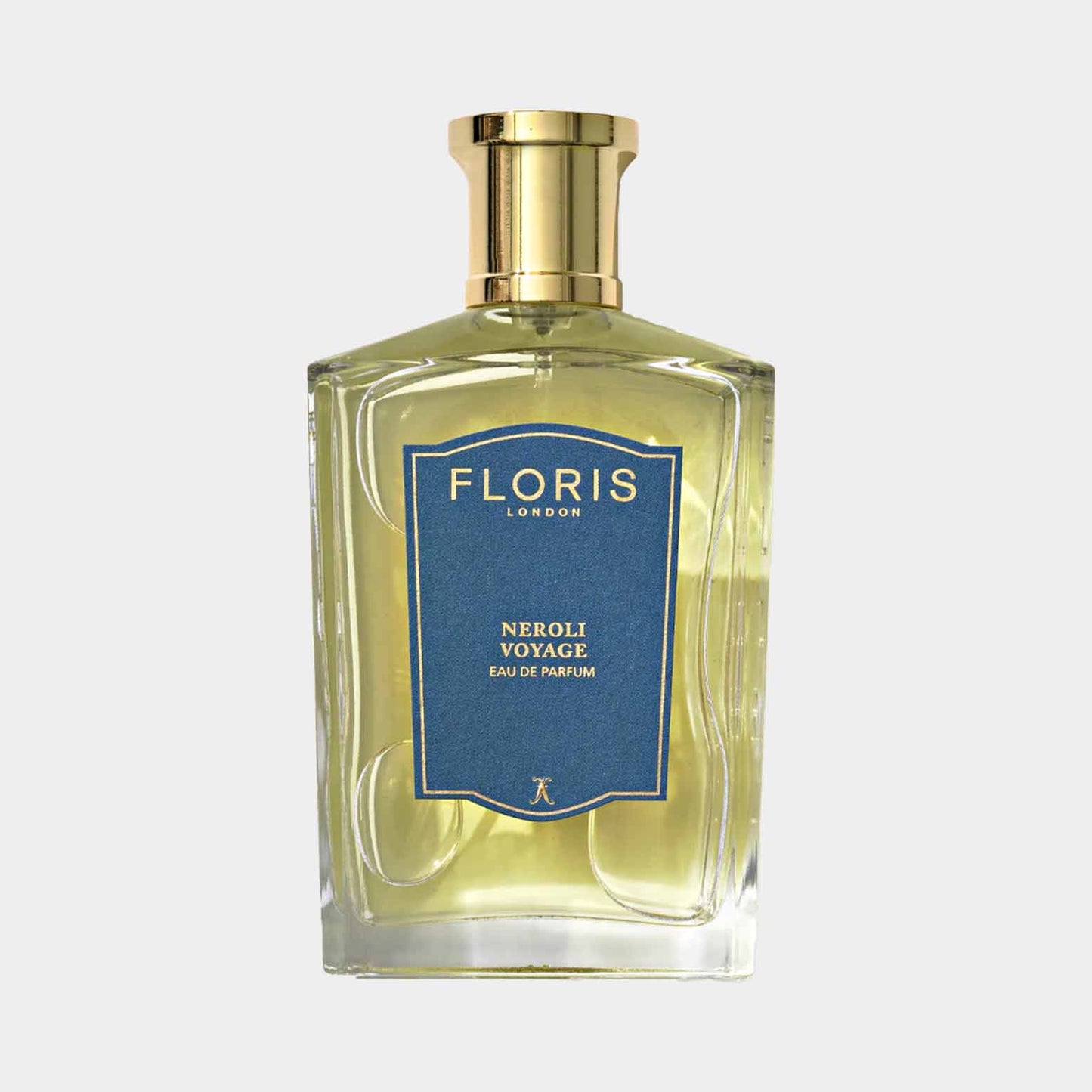 A bottle of Floris London Neroli Voyage Eau de Parfum, featuring a sleek glass design with a blue label and gold accents, showcasing a light yellow fragrance inside.