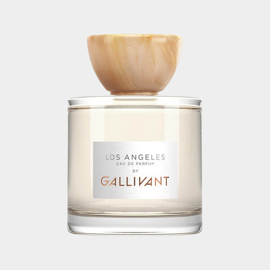 Gallivant Los Angeles full bottle of Eau de Parfum featuring a clear glass container and an elegant cream-colored cap.