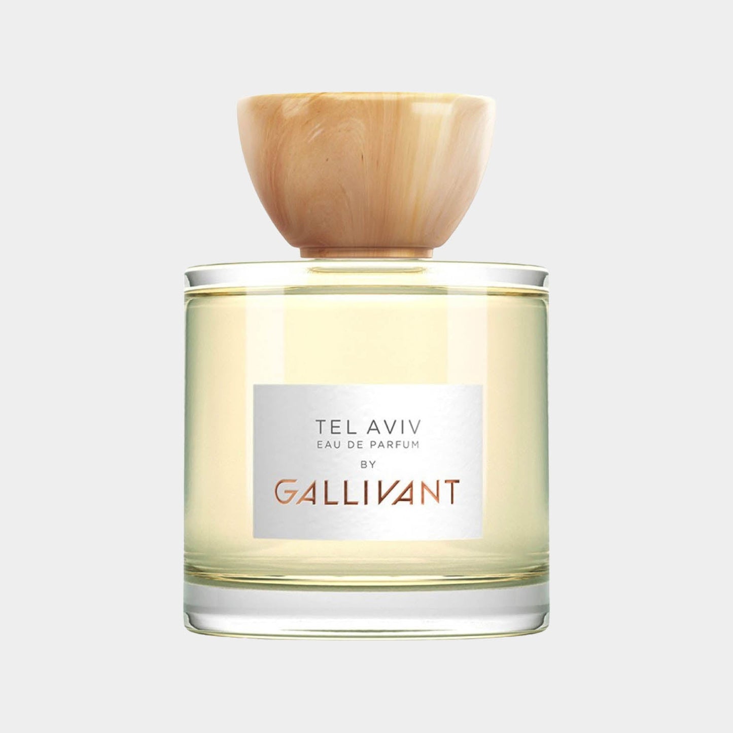 Gallivant Tel Aviv Sample, a clear glass perfume bottle featuring a natural wooden cap, filled with a light yellow fragrance. The label is minimalistic, showcasing the brand name Gallivant and the scent's title, Tel Aviv.