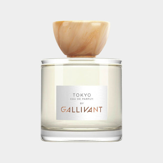 Gallivant Tokyo Full bottle featuring a sleek glass design with a wooden cap, showcasing the fragrance inside. The label displays Tokyo Eau de Parfum by Gallivant.