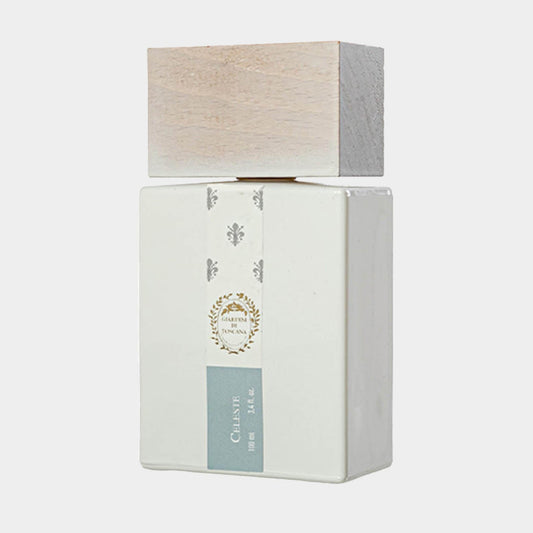 A stylish ceramic sample bottle of Giardini di Toscana Celeste, featuring a smooth white design and a wooden cap, elegantly showcasing a luxurious fragrance.