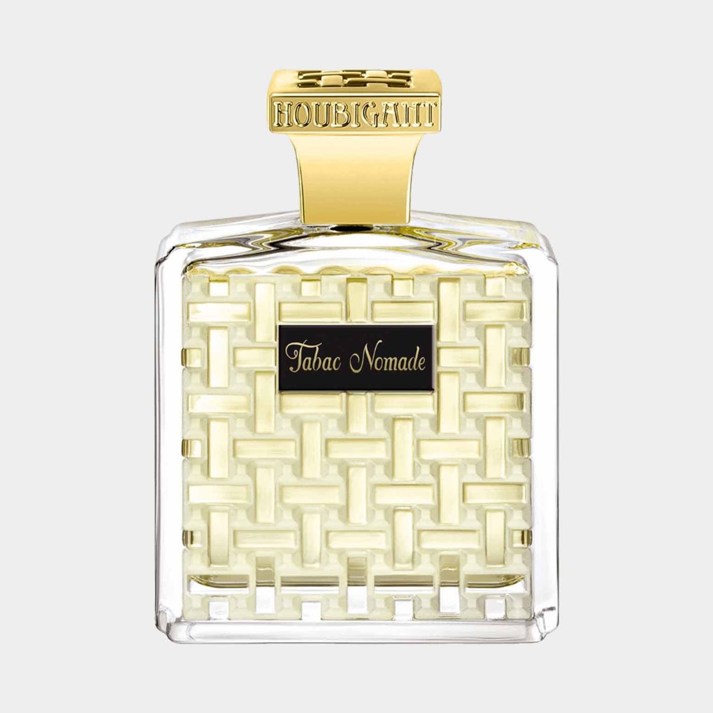 A small sample bottle of Houbigant Tabac Nomade, featuring an elegant square design with a woven pattern and a gold cap. The fragrance embodies a warm, rich scent profile.
