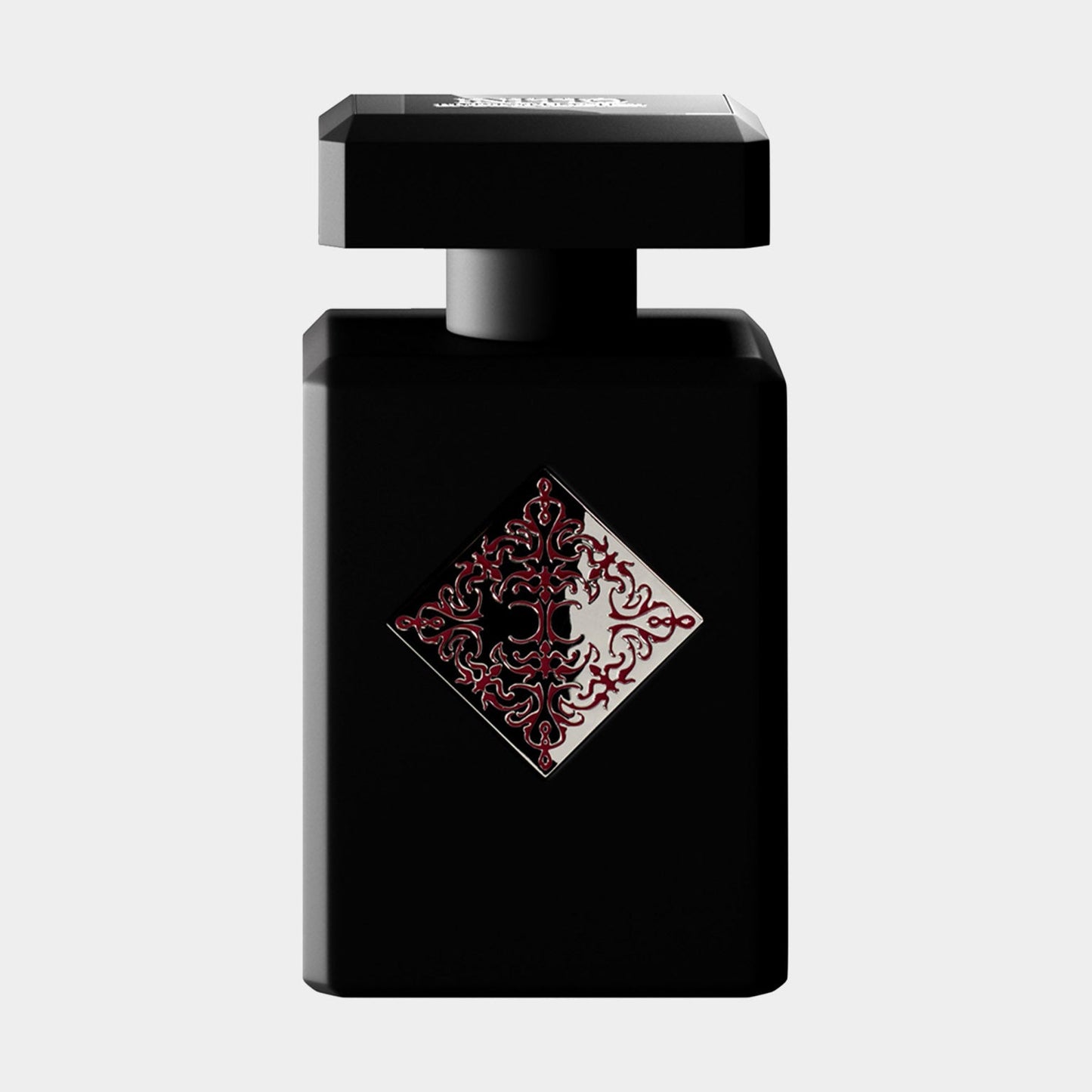 A sleek black perfume bottle for Initio Addictive Vibration Sample, featuring an ornate red decorative design on the front. The bottle's modern shape adds elegance to the luxurious fragrance inside.