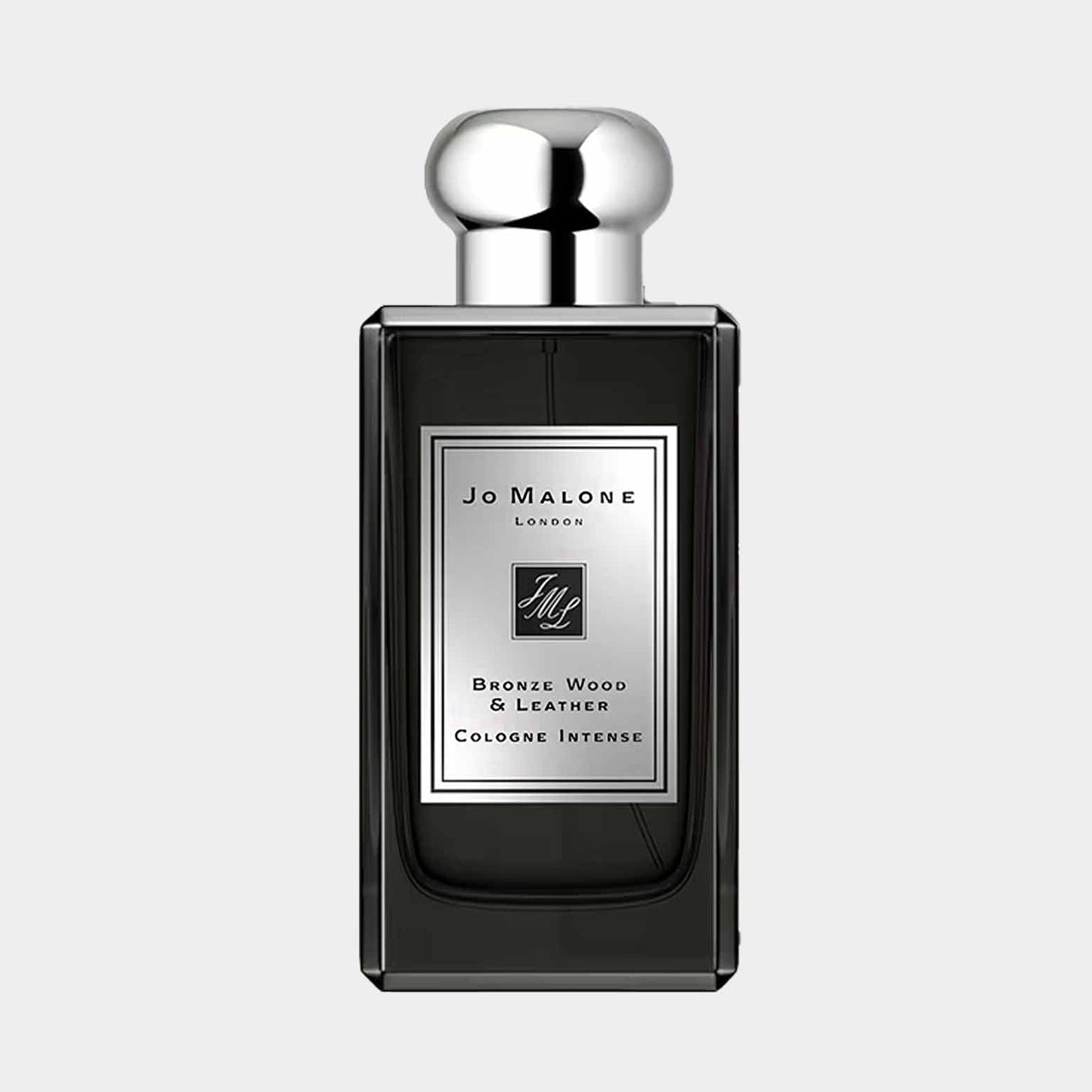 A sample bottle of Jo Malone London Bronze Wood & Leather, featuring a sleek design with a silver label and cap, showcasing its elegant and intense fragrance.