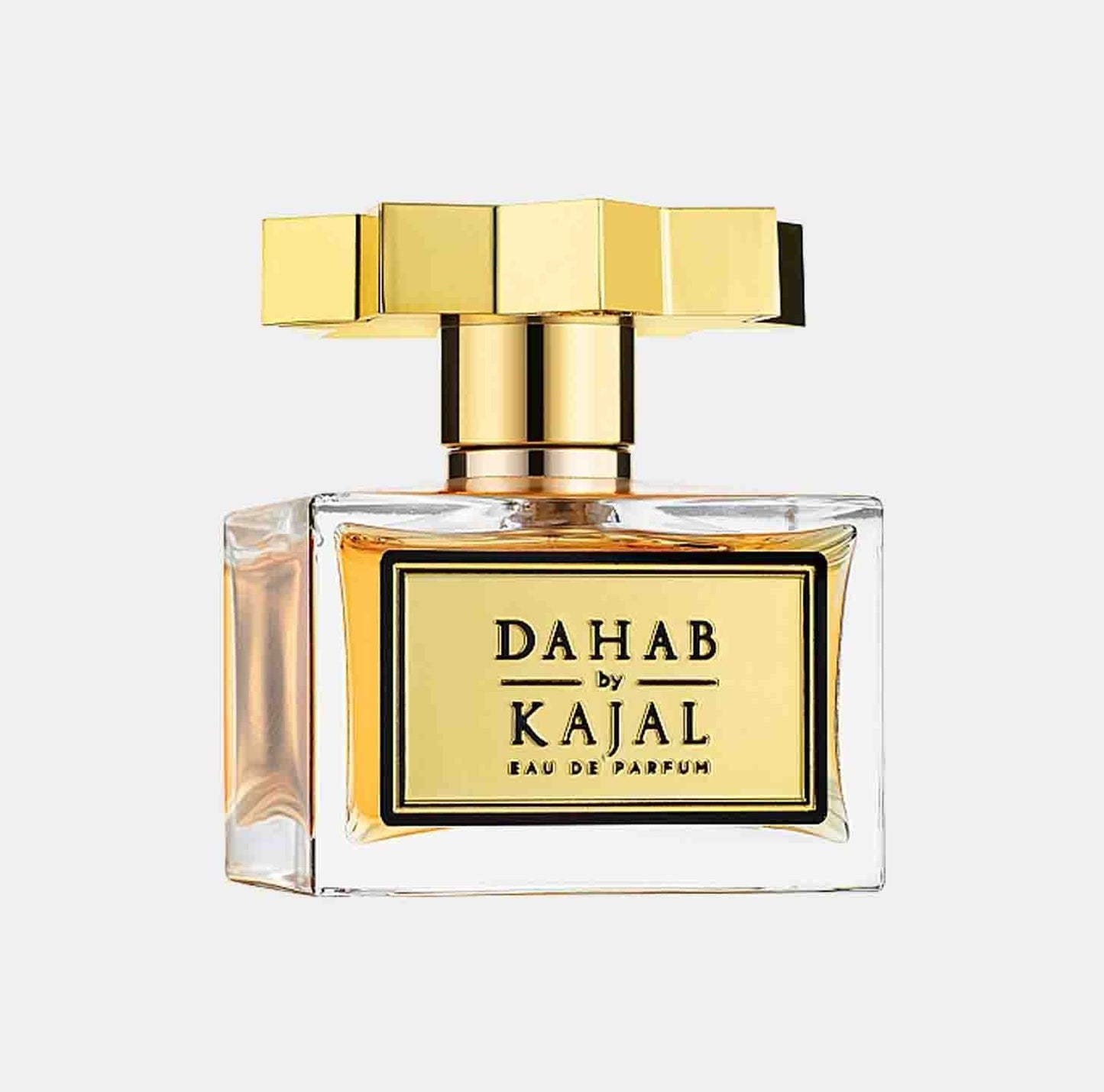 Kajal Dahab Sample is a luxurious eau de parfum featuring an elegant glass bottle with a striking gold cap and a classic design, exuding a sense of sophistication.