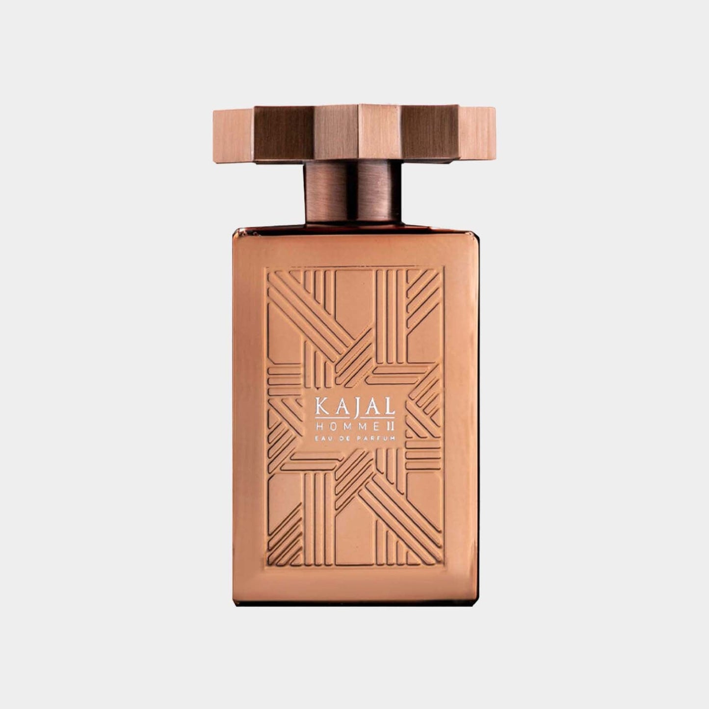 Kajal Homme II full bottle featuring an elegantly designed rose gold and bronze bottle with intricate patterns and a distinctive square cap.