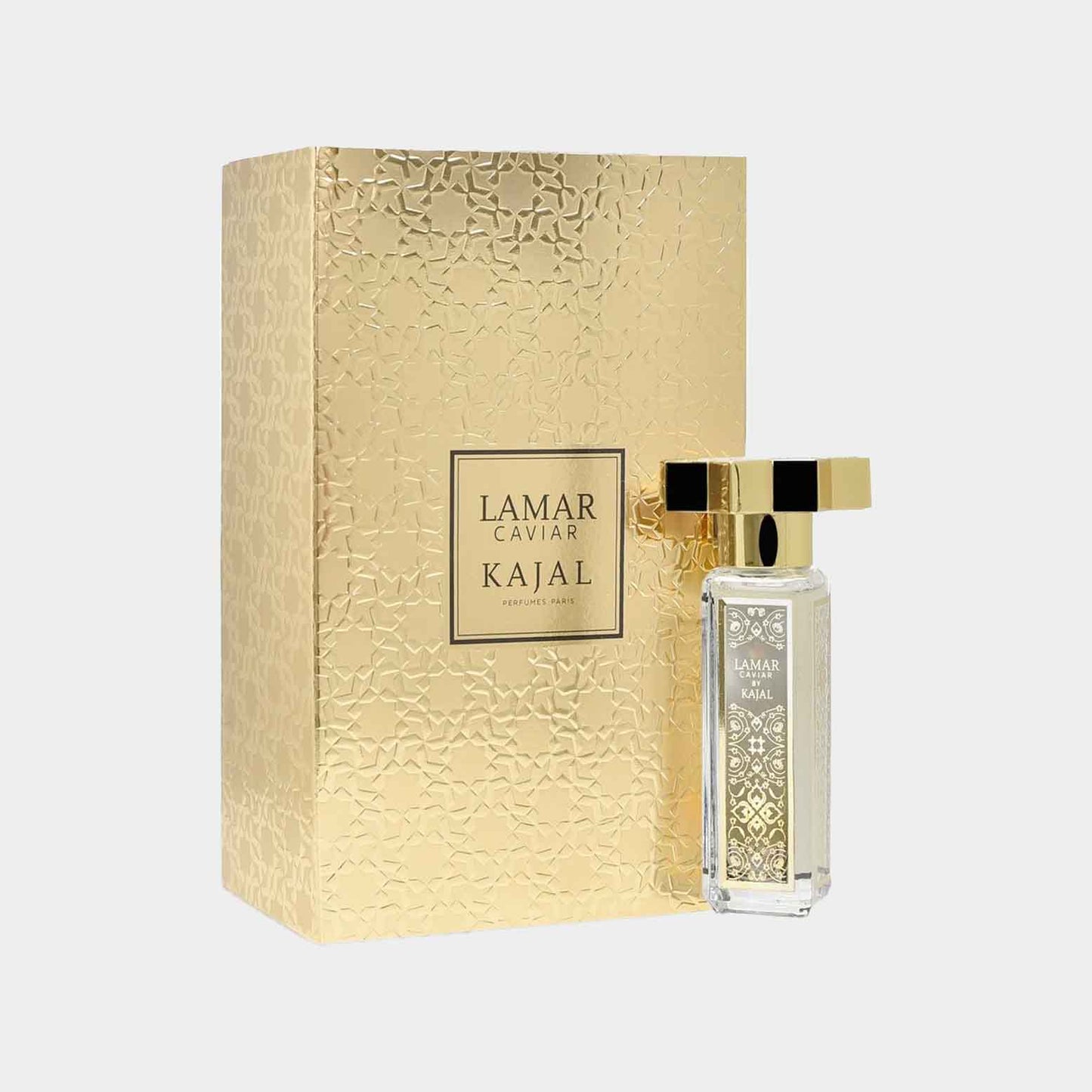 A full bottle of Kajal Lamar Caviar Parfum D'Eau is elegantly packaged in a decorative gold box, showcasing a luxurious design with intricate patterns. The perfume bottle features a clear glass design topped with a gold cap.