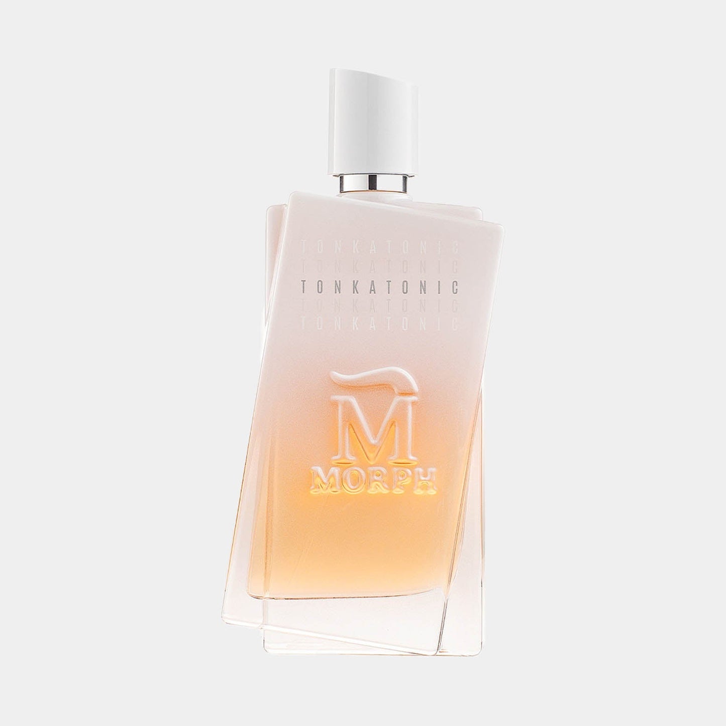 Morph Tonkatonic Sample is a elegantly designed fragrance bottle featuring soft gradients from clear to amber, showcasing its luxurious scent.
