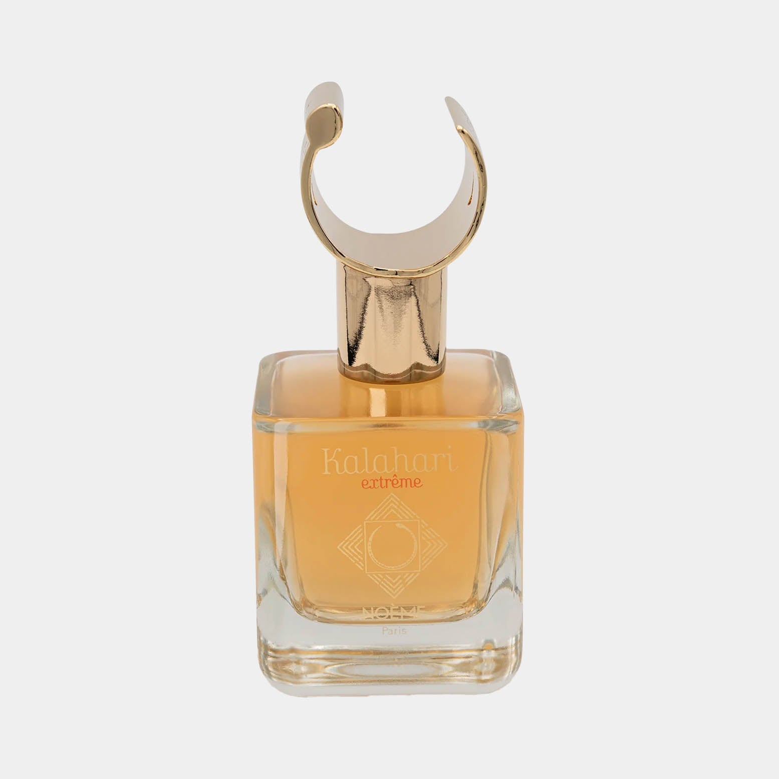 A stylish sample bottle of Noème Paris Kalahari Extreme perfume, featuring a square glass design and a distinctive gold loop cap, showcasing its amber-colored fragrance inside.