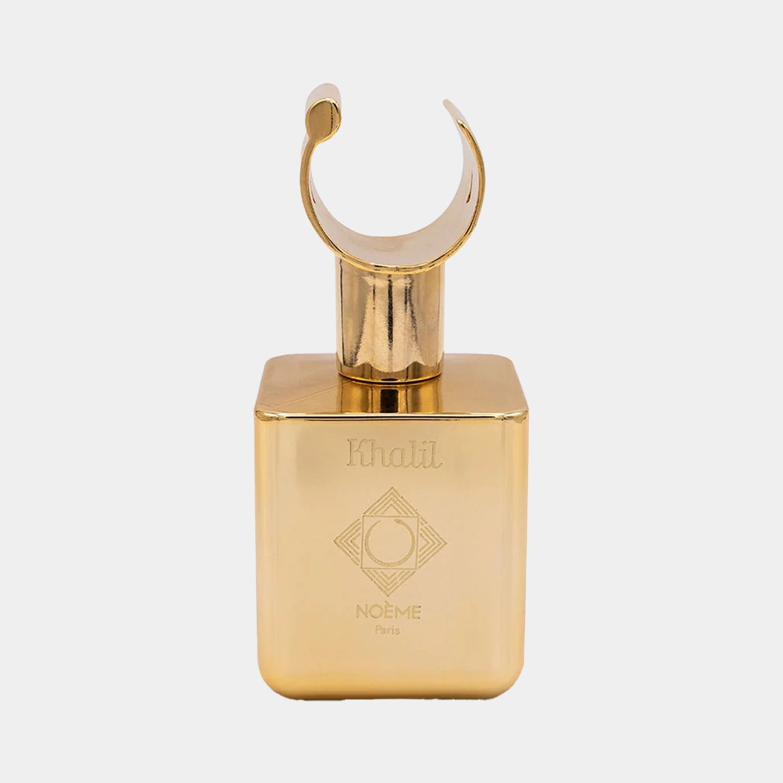 Noème Paris Khalil Sample features an elegant gold bottle with a unique curved cap, showcasing a luxurious and artistic design.
