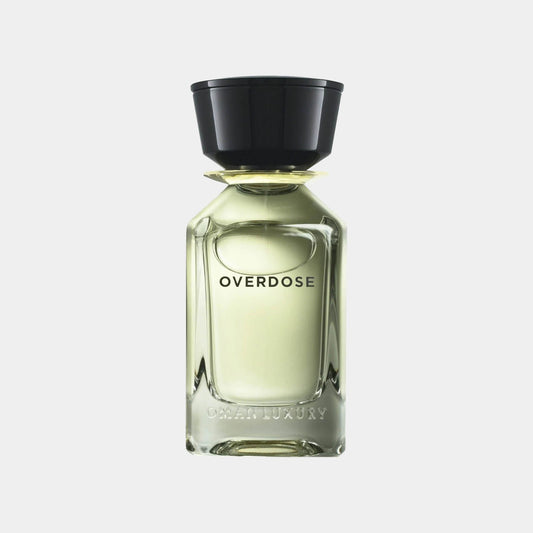 A sleek glass bottle of Omanluxury Overdose Sample perfume, featuring a minimalist design with a black cap and the word OVERDOSE elegantly displayed on the front.