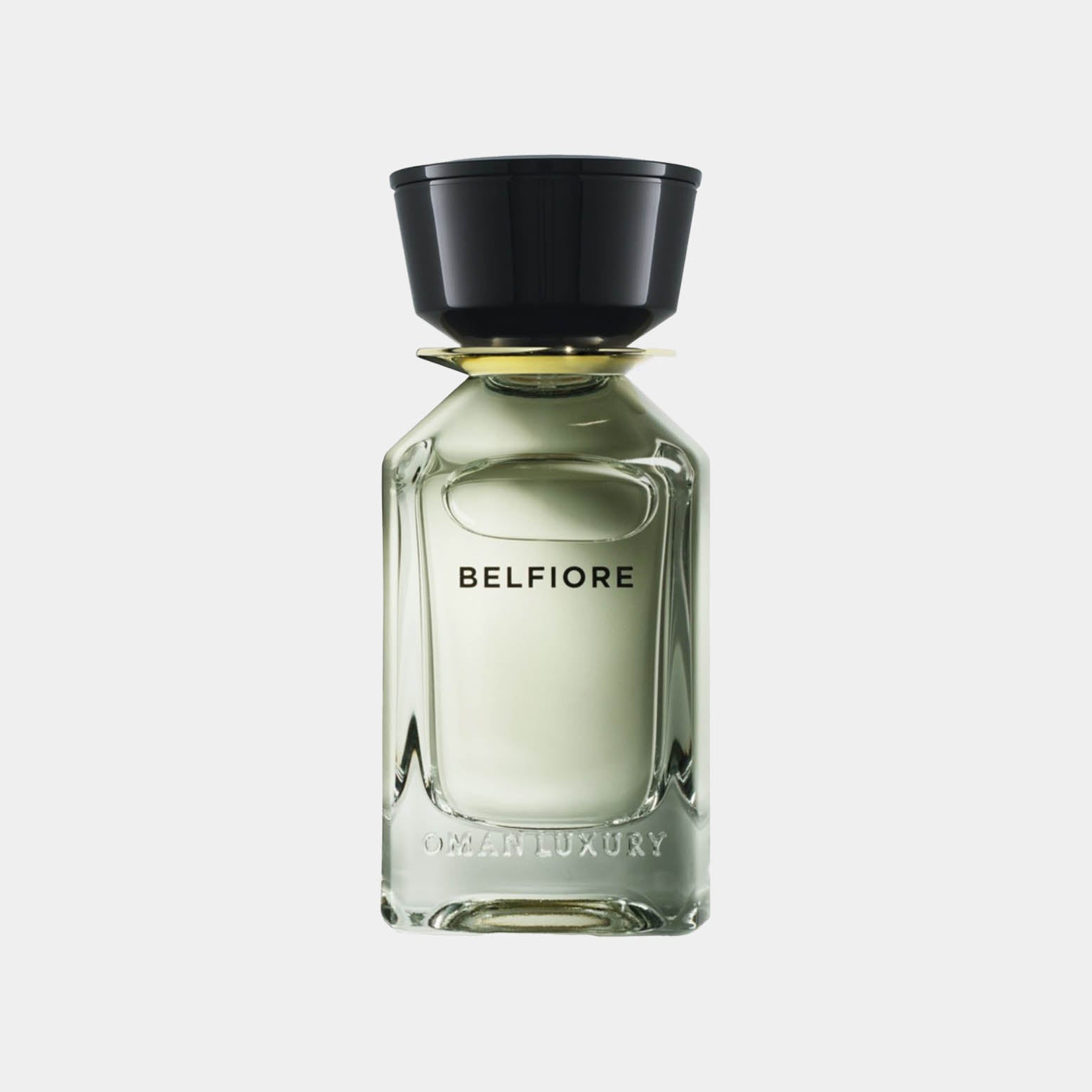 A sleek glass perfume bottle labeled Belfiore from Omanluxury, featuring a black cap and a minimalist design that highlights its elegant simplicity.