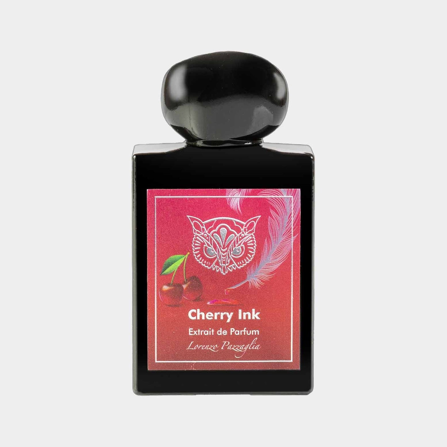 A full bottle of Lorenzo Pazzaglia Cherry Ink, featuring a sleek black container with a round cap and a vibrant label showcasing cherries and a feather, labeled Cherry Ink Extrait de Parfum.