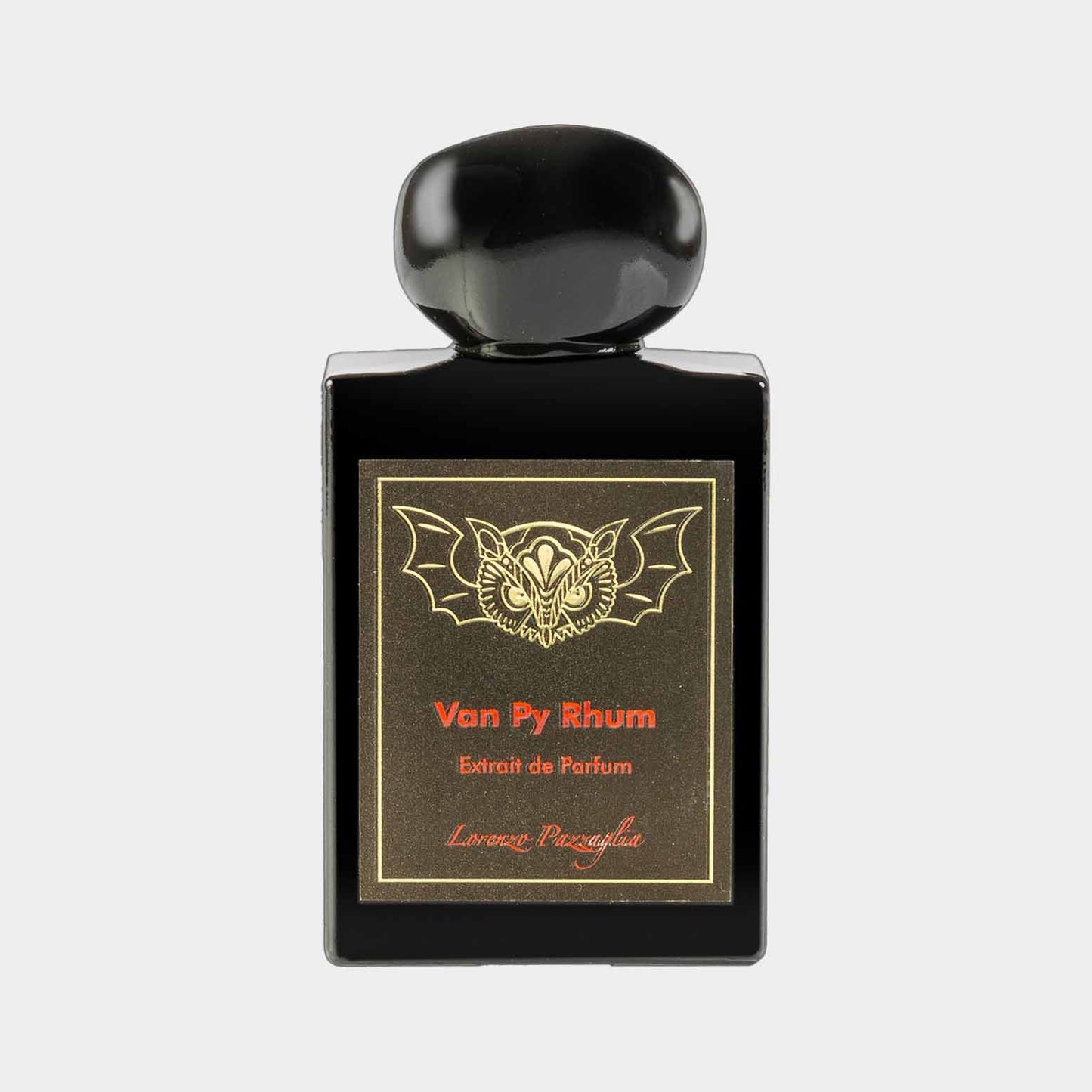 A full bottle of Lorenzo Pazzaglia Van Py Rhum, featuring a sleek black container with a decorative gold label and a decorative bat emblem on the front.