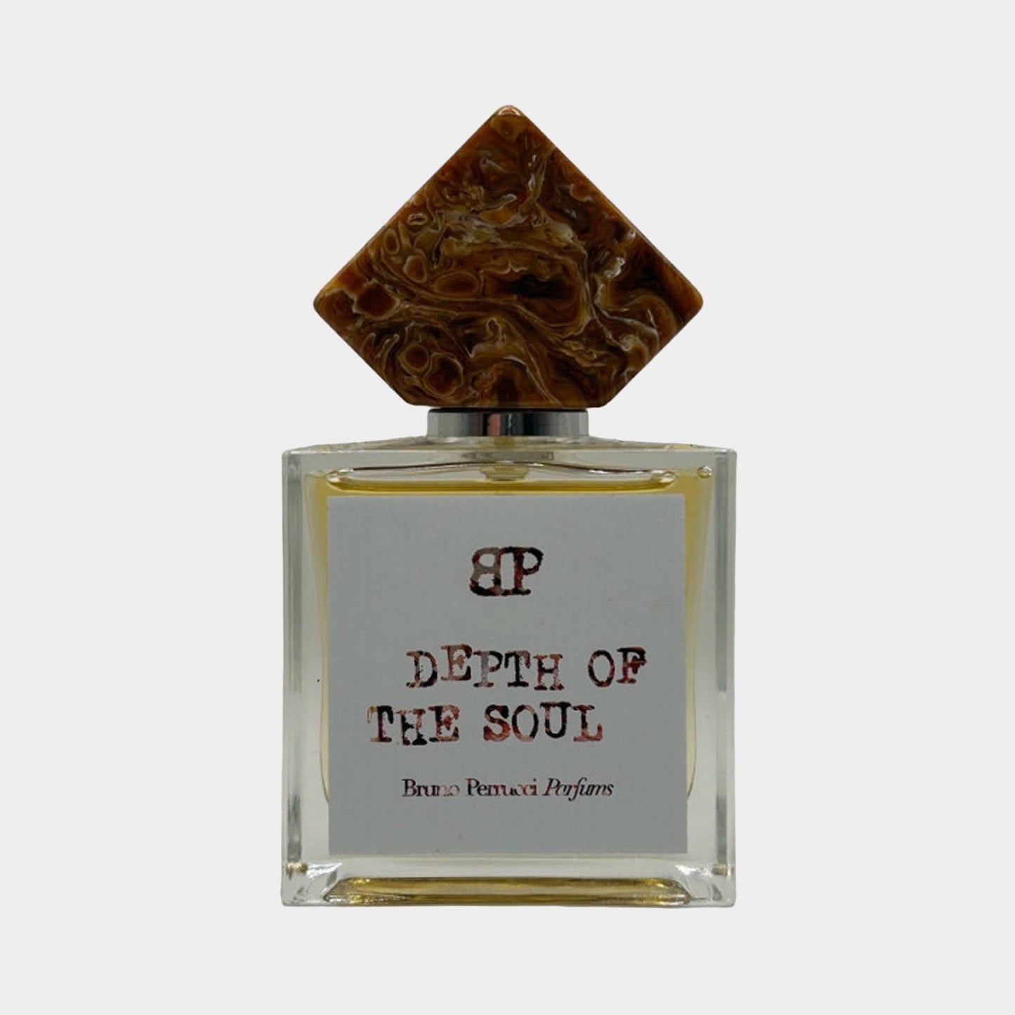 Bruno Perrucci Depth of Soul Sample fragrance bottle featuring a decorative brown cap and a clean, minimalist label.