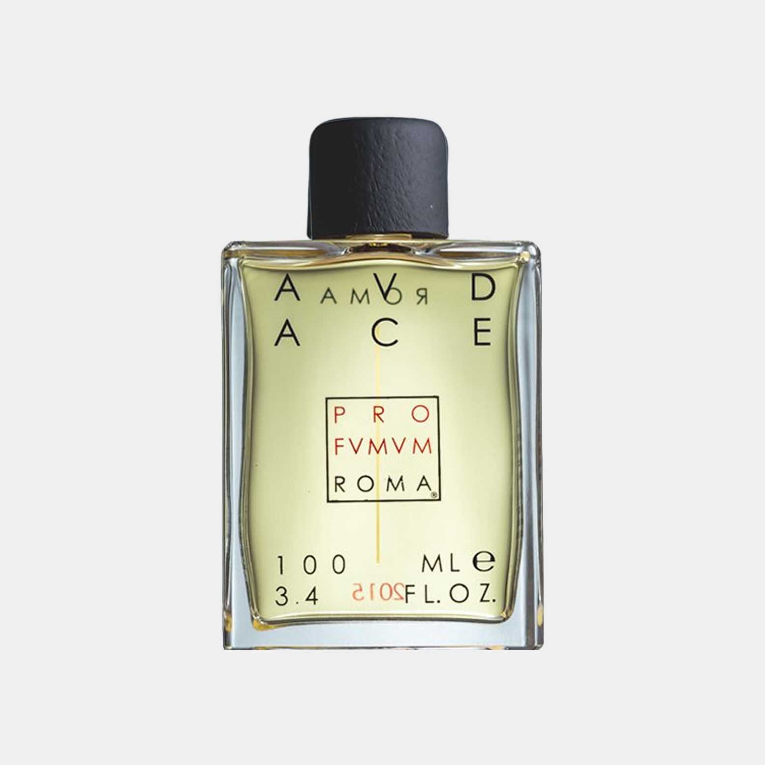 A square glass bottle of Profumum Roma Audace, featuring a minimalist design with a black cap and yellow-green fragrance visible inside. The label displays the brand name and product details.