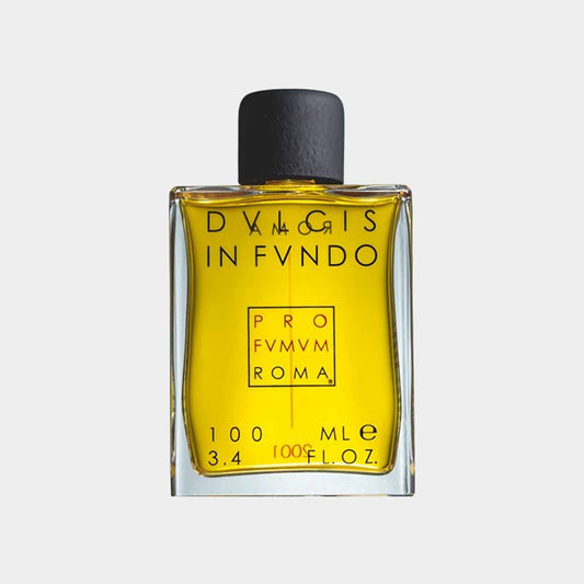 A classy glass bottle of Profumum Roma Dulcis In Fundo Sample, featuring a distinctive yellow liquid and a black cap, showcasing the elegant design typical of the brand.